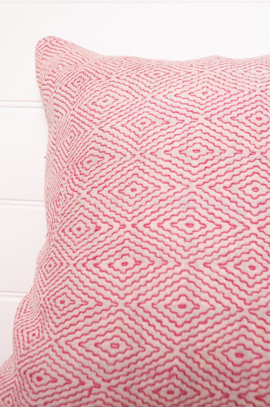 VIntage kantha quilt cushion embroidered red diamonds on white.