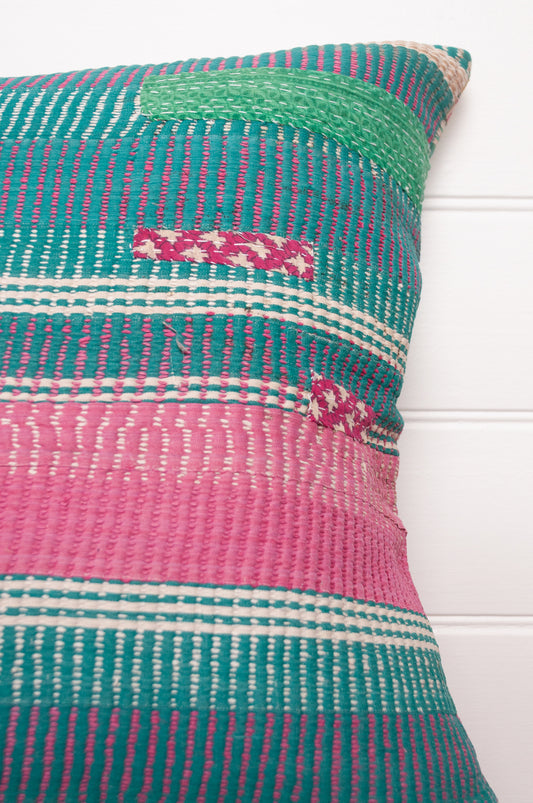 Vintage kantha cushion with stripes in pink, blue and green, finely stitched.