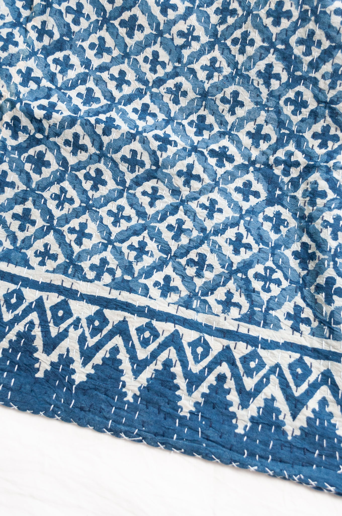 Kantha quilt indigo blockprint pure cotton in dot and cross pattern.
