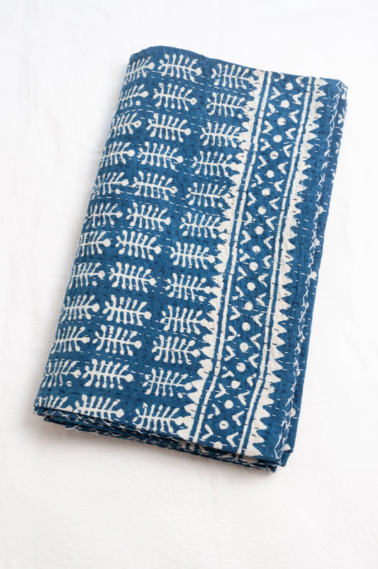 Indigo blue and white pure cotton kantha stitch bed quilt with fern design.