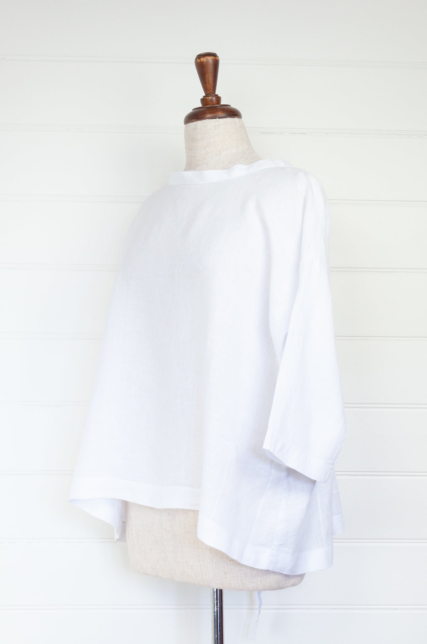 Banana Blue made in Melbourne white linen top with peplum tie.