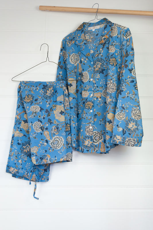 Juniper Hearth cotton voile pyjamas in Magenta sky floral print on sky blue.