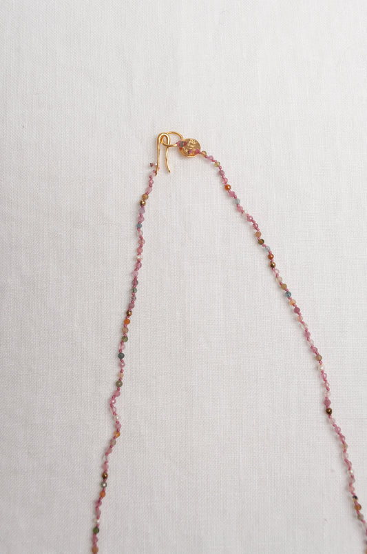 Mary Gaitani handmade tourmalines necklace with gold charms.