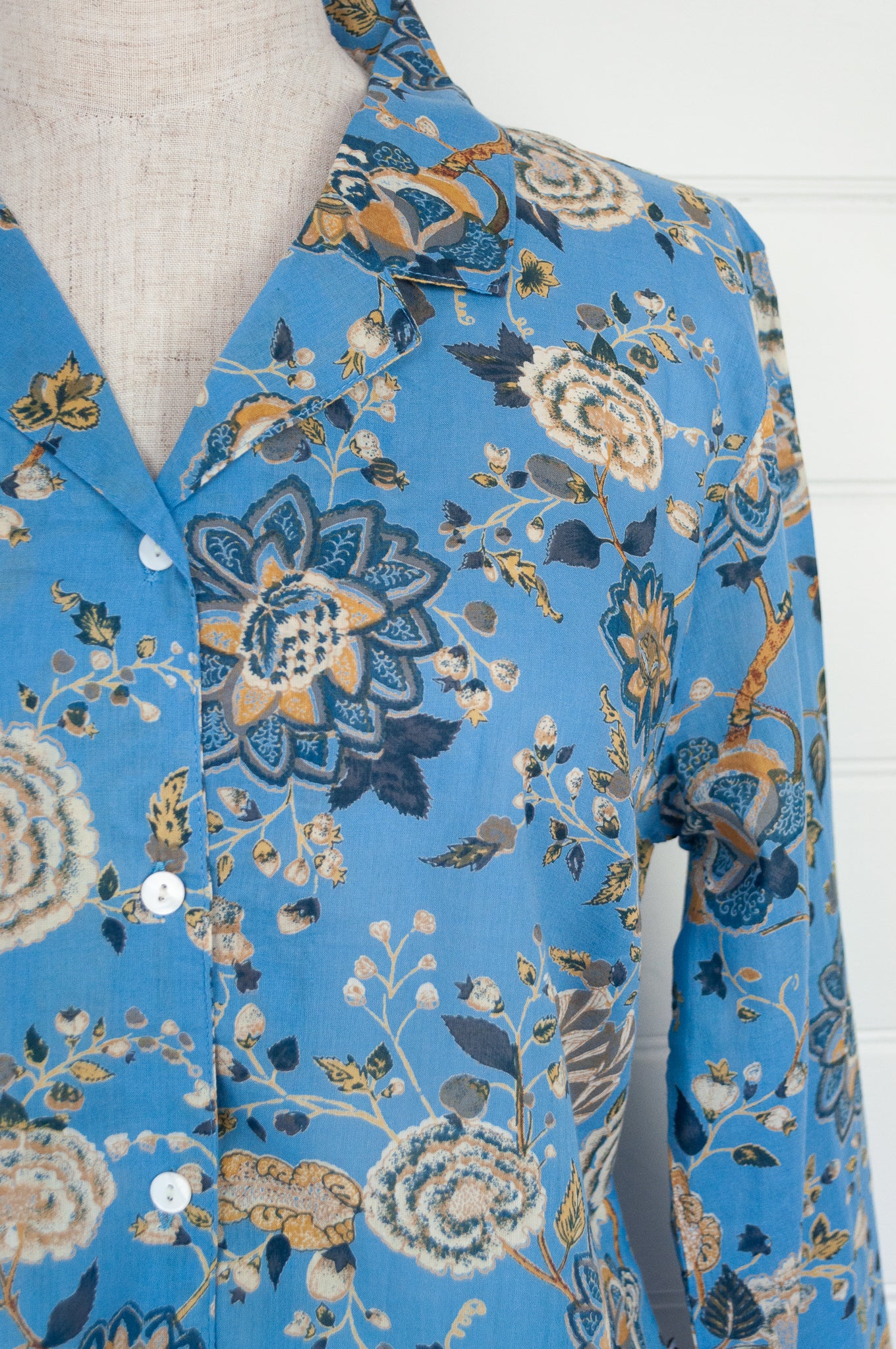 Juniper Hearth cotton voile pyjamas in Magenta sky floral print on sky blue.