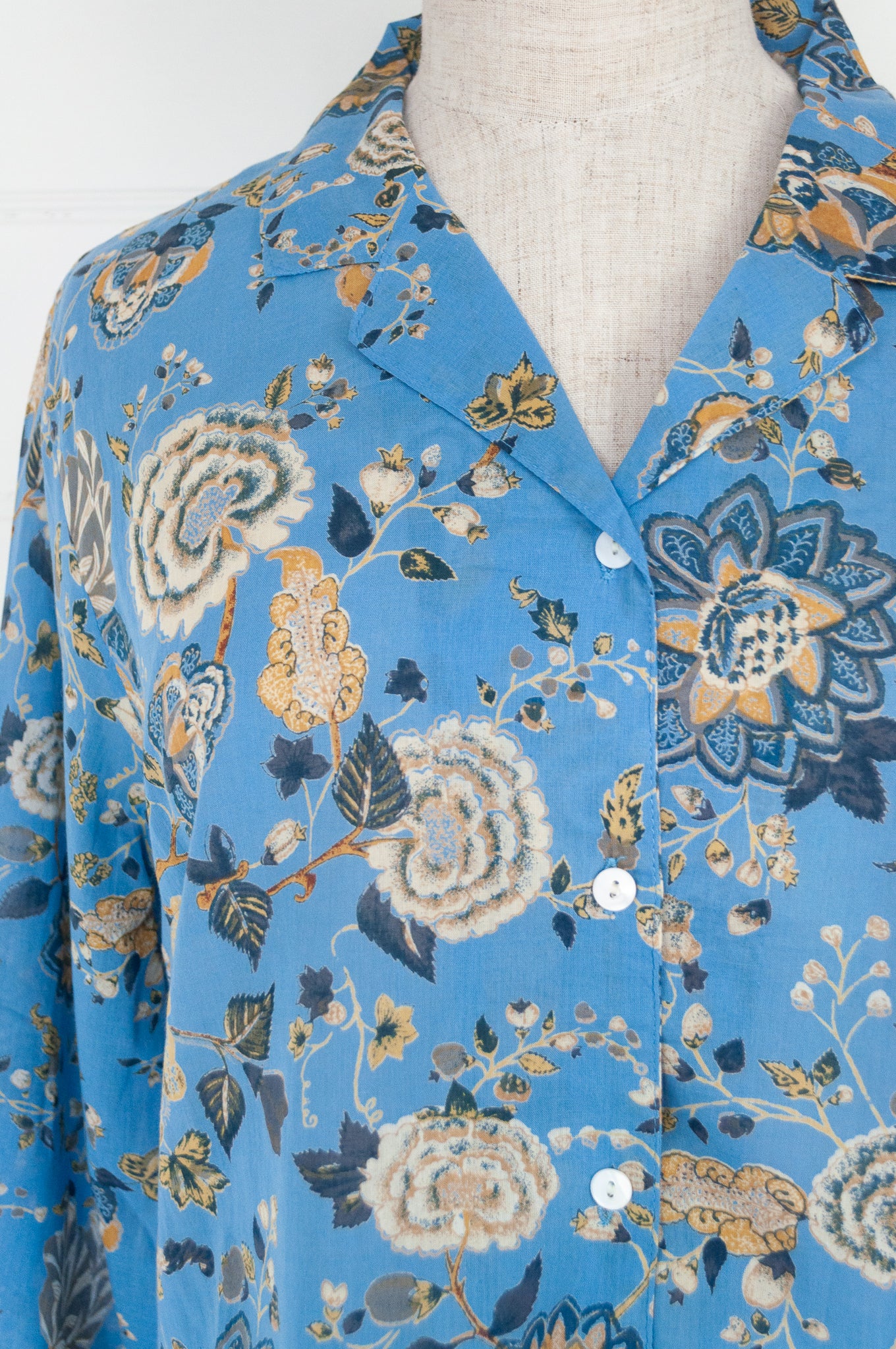 Juniper Hearth cotton voile pyjamas in Magenta sky floral print on sky blue.
