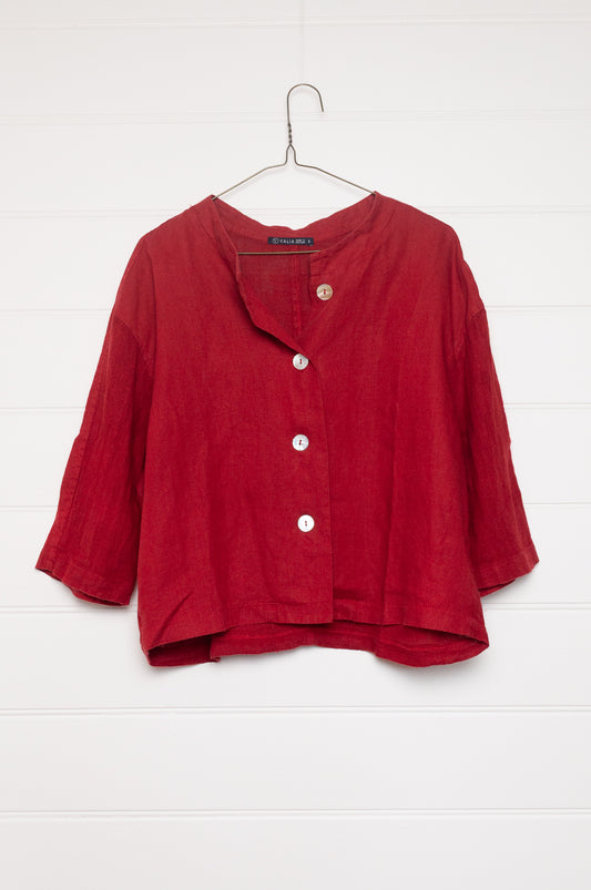 Valia pure linen Port Fairy jacket made in Melbourne with round neck, gauze panels and button closure in ketchup red.