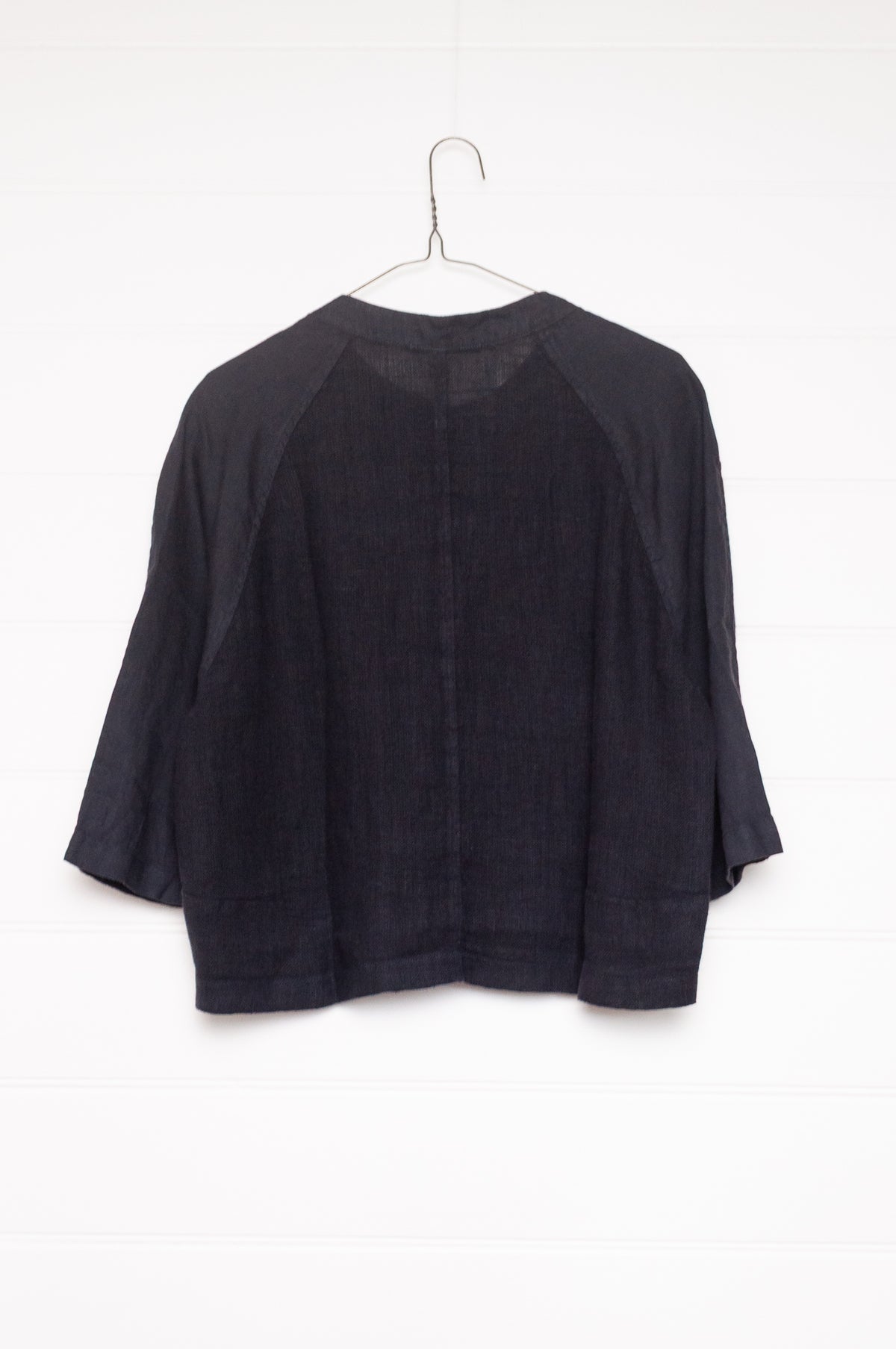 Valia pure linen Port Fairy jacket made in Melbourne with round neck, gauze panels and button closure in deep navy blue.