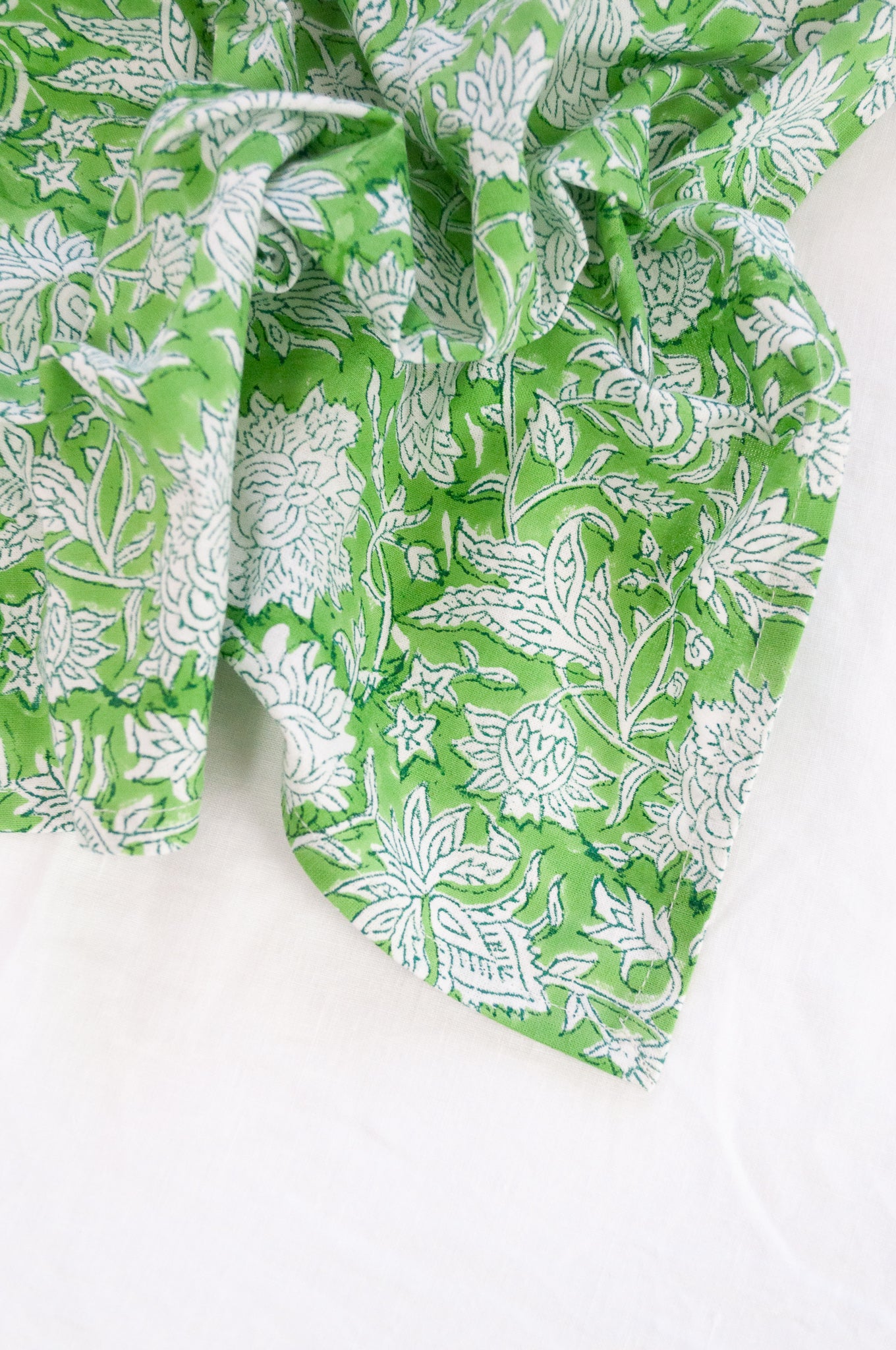 Blockprinted cotton napkins in lime green and white floral design, made by hand.