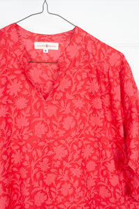 Juniper Hearth Gina dress, loose fitting three quarter sleeved frilled hem, cherry red pink blockprint floral in organic cotton.