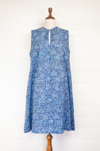 Load image into Gallery viewer, Juniper Hearth Stella dress in blue grey blockprint floral cotton, A-line sleeveless with front ties.