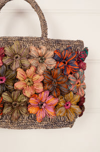 Beautiful hand crocheted crochet small bag with colourful flowers.