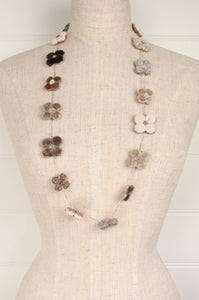 Sophie Digard hand made linen and velvet four petal flower necklace.