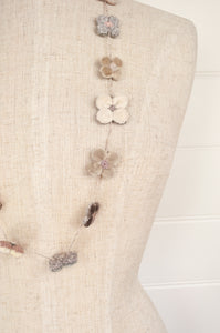 Sophie Digard hand made linen and velvet four petal flower necklace.