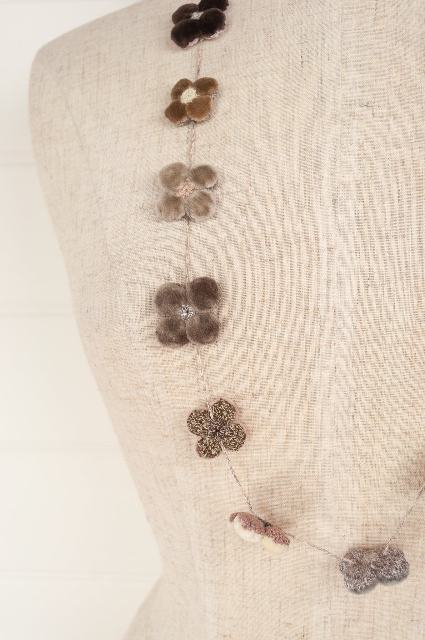 Sophie Digard hand made linen and velvet four petal flower necklace.