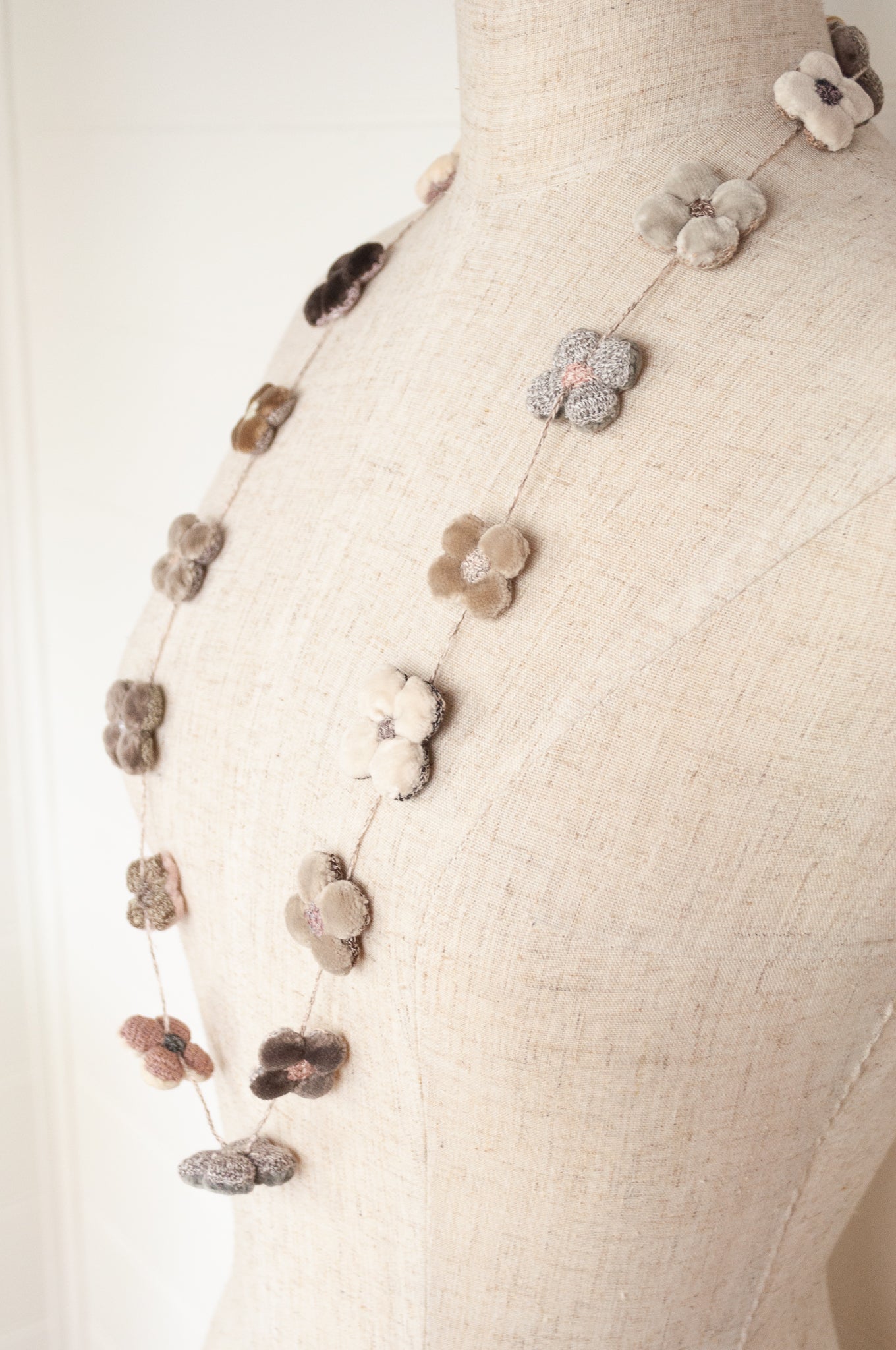 Sophie Digard hand made linen and velvet four petal flower necklace.