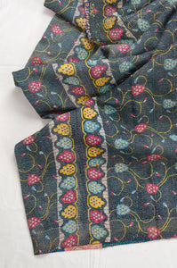 Vintage kantha quilt, colourful floral on ink black with multi-colour patch panels on the reverse.