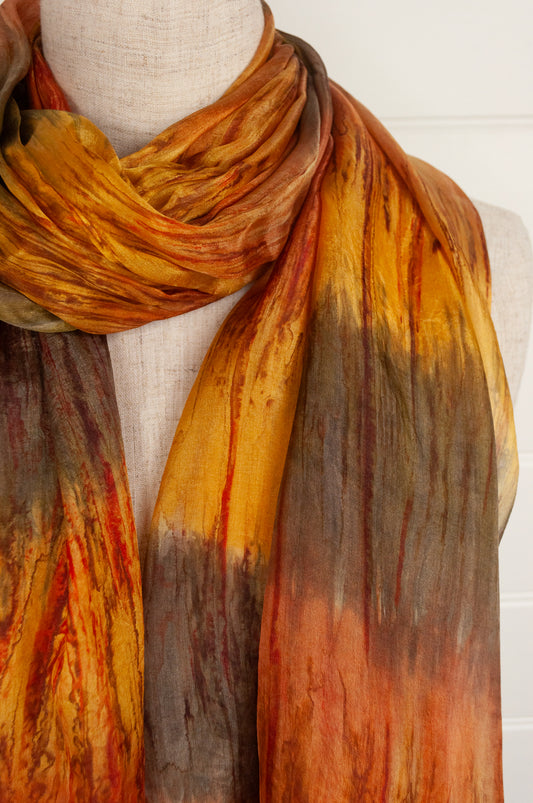 Pure silk scarf tie dye in shades of gold, bronze and pewter.