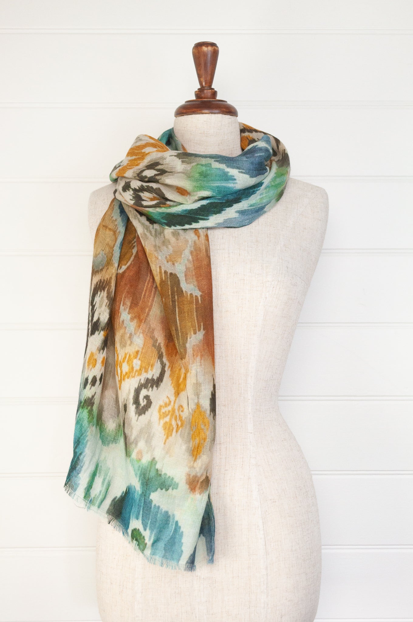 Juniper Hearth fine wool silk scarf in mustard and teal ikat design.