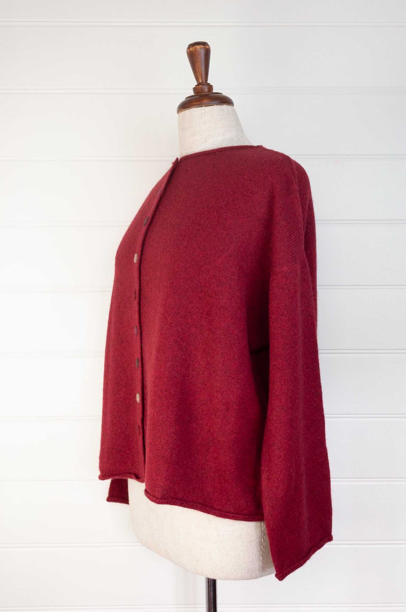Baby yak one size reversible cardigan sweater with hand embroidered buttons in cherry red.