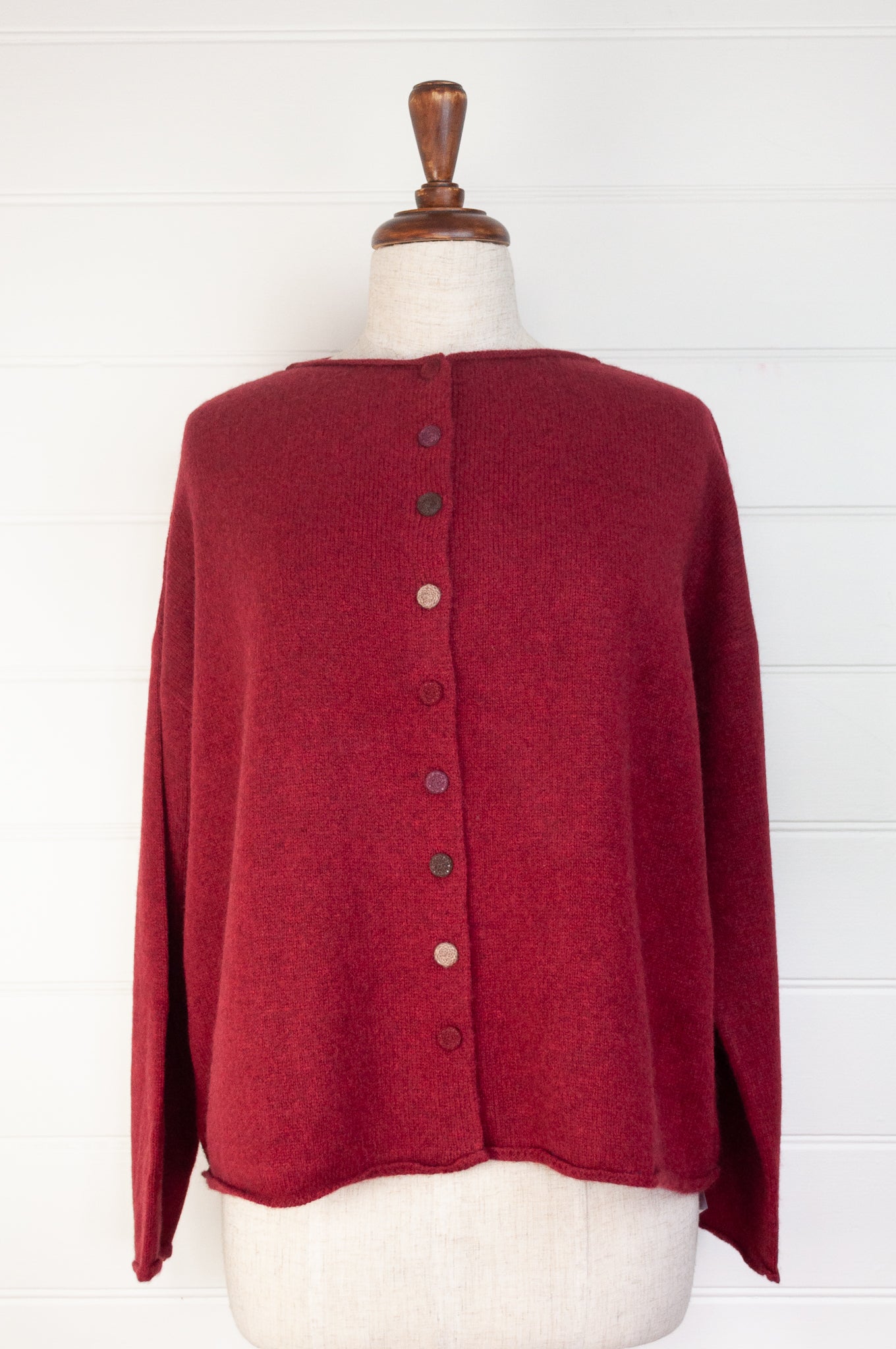 Baby yak one size reversible cardigan sweater with hand embroidered buttons in cherry red.