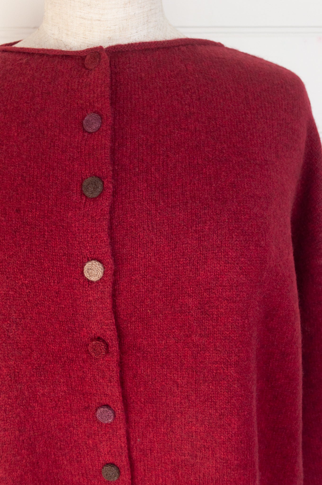 Baby yak one size reversible cardigan sweater with hand embroidered buttons in cherry red.