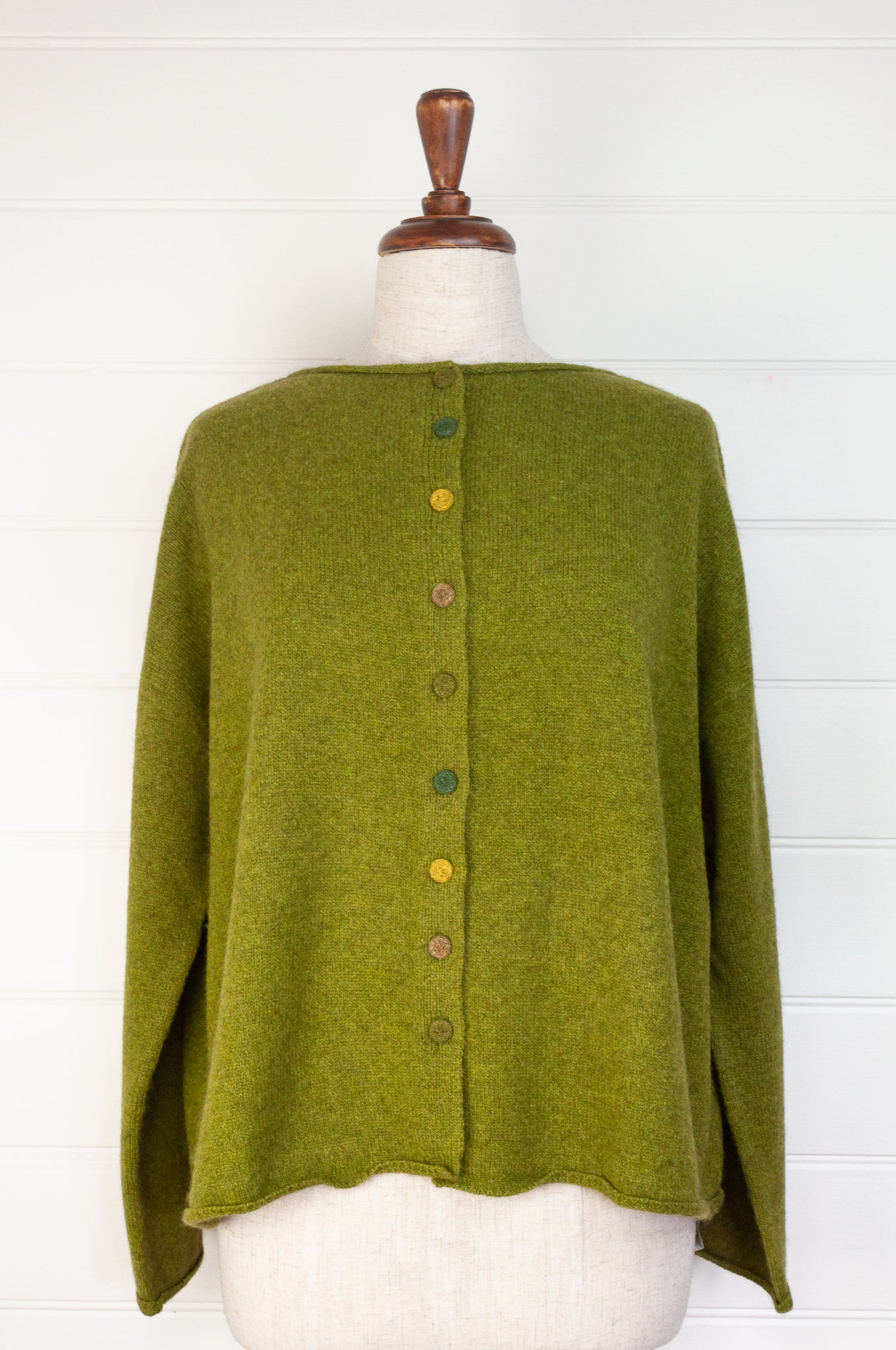 Baby yak one size reversible cardigan sweater with hand embroidered buttons in chartreuse green.