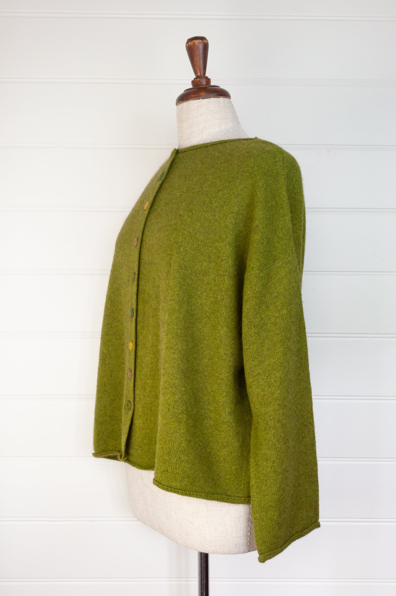 Baby yak one size reversible cardigan sweater with hand embroidered buttons in chartreuse green.