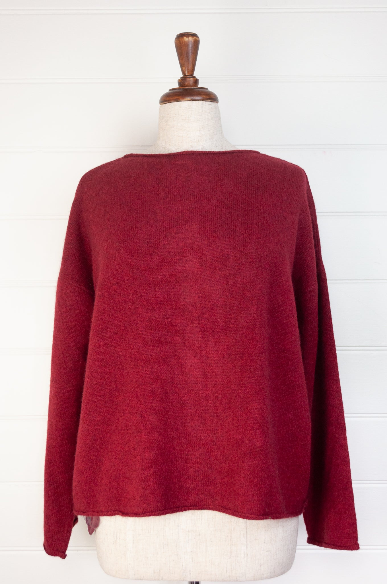 Baby yak one size reversible cardigan sweater with hand embroidered buttons in cherry red.