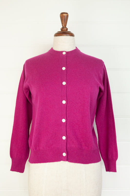 Juniper Hearth 100% cashmere button up crew neck cropped cardigan in magenta pink..