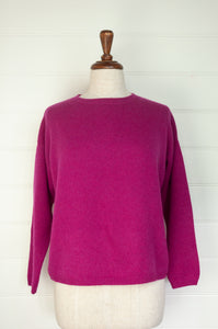 One size crew neck cashmere sweater ethically made in Nepal in vibrant magenta pink.