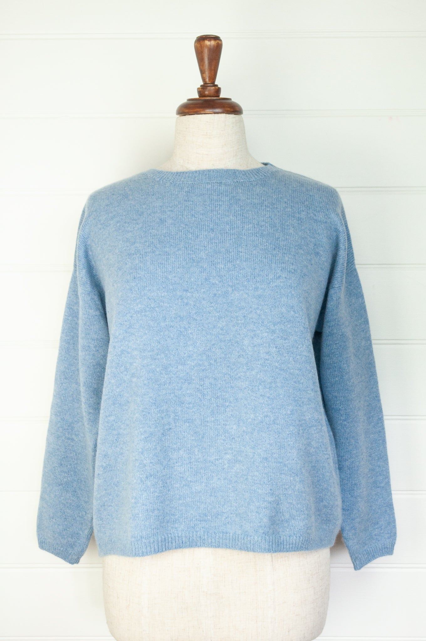 One size crew neck cashmere sweater ethically made in Nepal in sky blue.