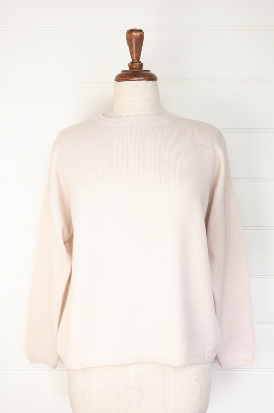 One size crew neck cashmere sweater ethically made in Nepal in blush ecru cream.