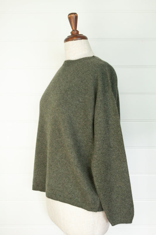 One size crew neck cashmere sweater ethically made in Nepal in olive green.