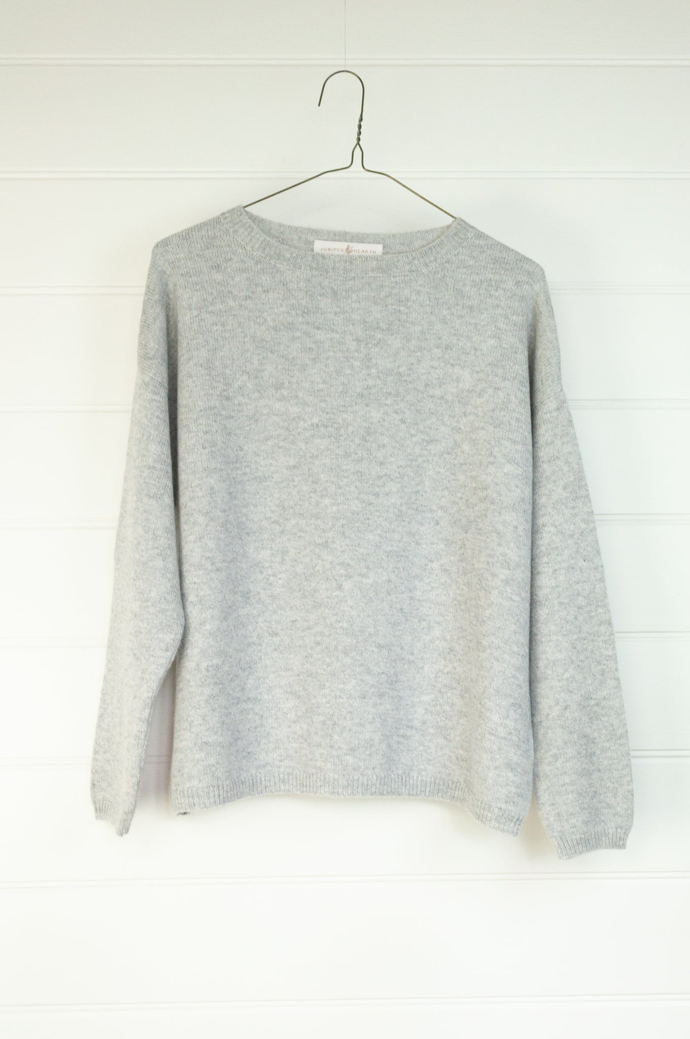 One size pure cashmere crew neck sweater in ash grey.