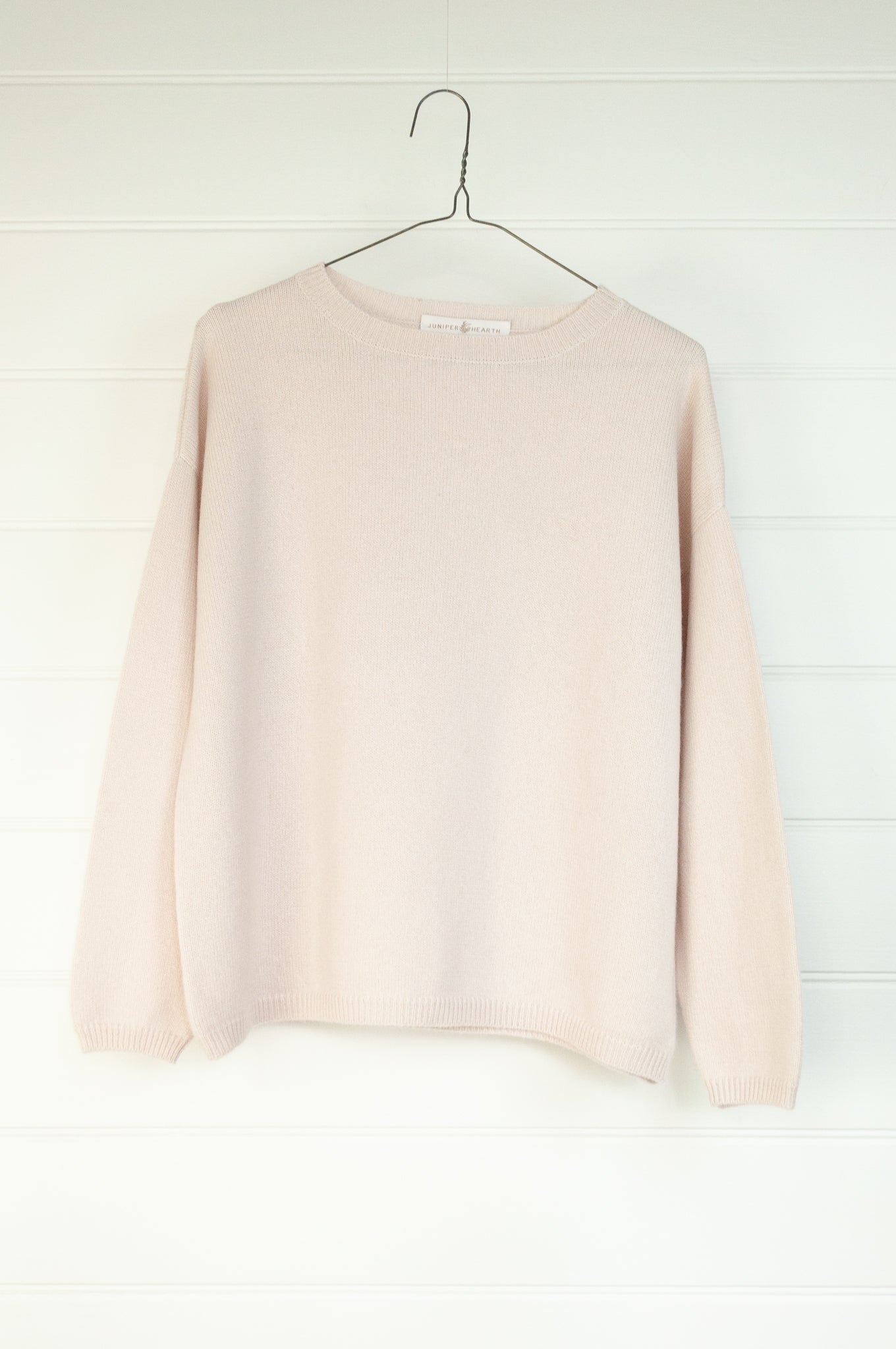 One size crew neck cashmere sweater ethically made in Nepal in blush ecru cream.