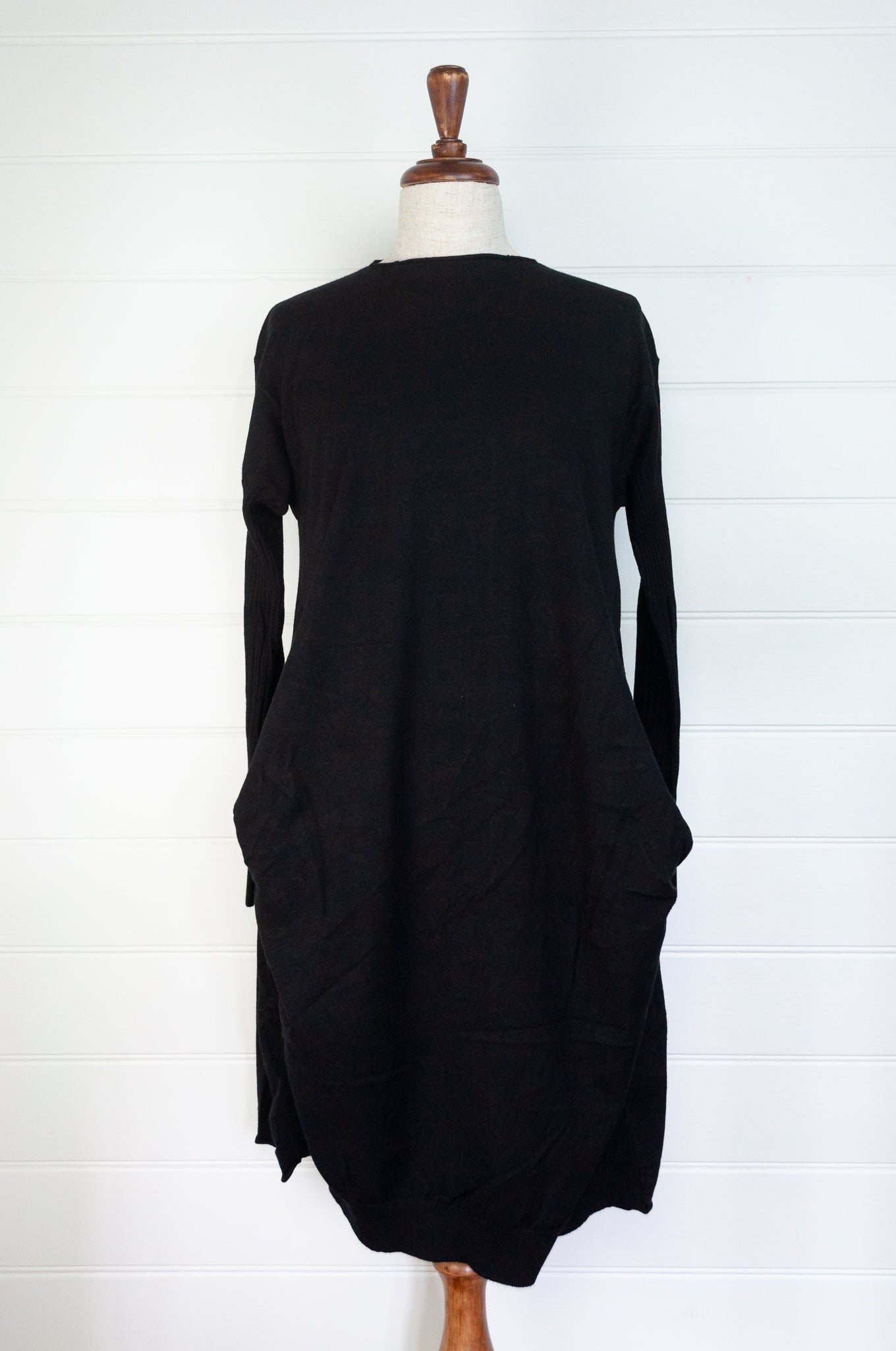 Banana Blue black poly voly tunic with ribbing and panelling and front bagged pockets.