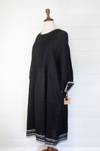 Load image into Gallery viewer, DVE Collection Anisha dress in black linen with selvedge and pintuck details.