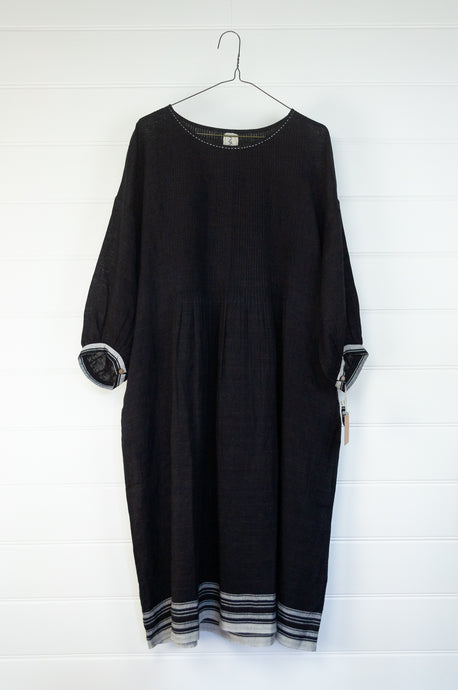 DVE Collection Anisha dress in black linen with selvedge and pintuck details.