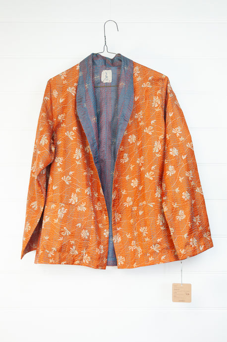 DVE Collection one of a kind reversible silk kantha Neeli jacket has a simple floral print on saffron on one side, and also on the reverse on steel blue.