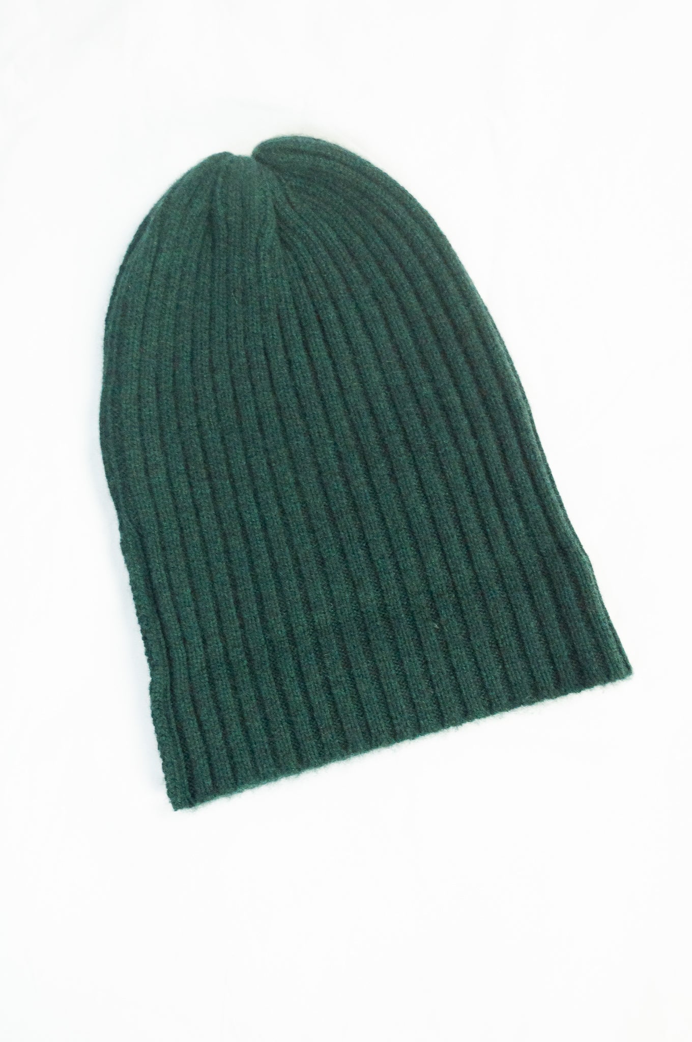 Juniper Hearth 100% cashmere ribbed knitted beanie in bottle green.