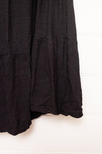 Load image into Gallery viewer, Valia made in Melbourne Gardener skirt in black wool jersey, elastic waist, gathered with frill at hem.