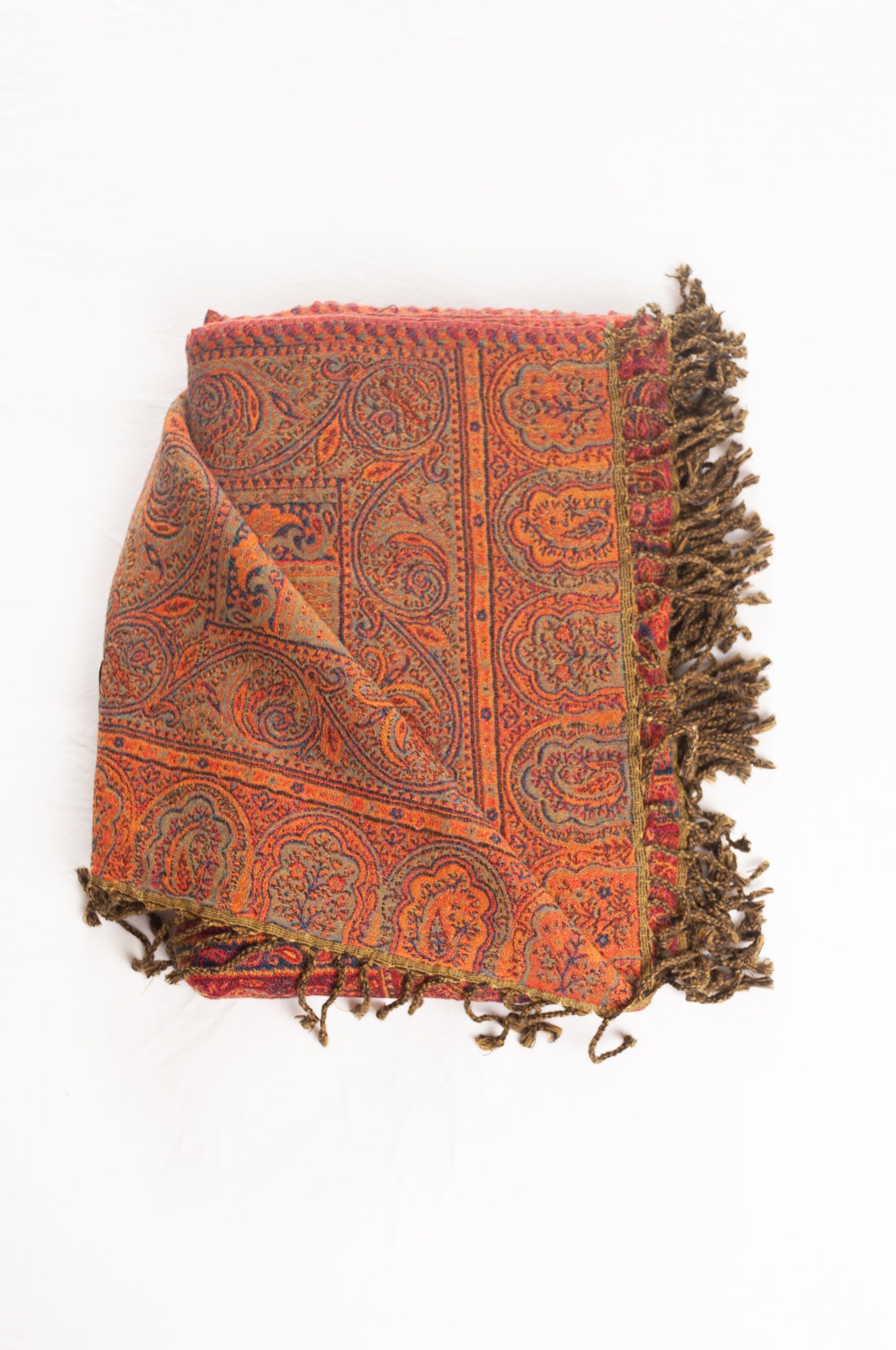 Juniper Hearth ruby and magenta, pure wool jacquard paisley tasseled throw.