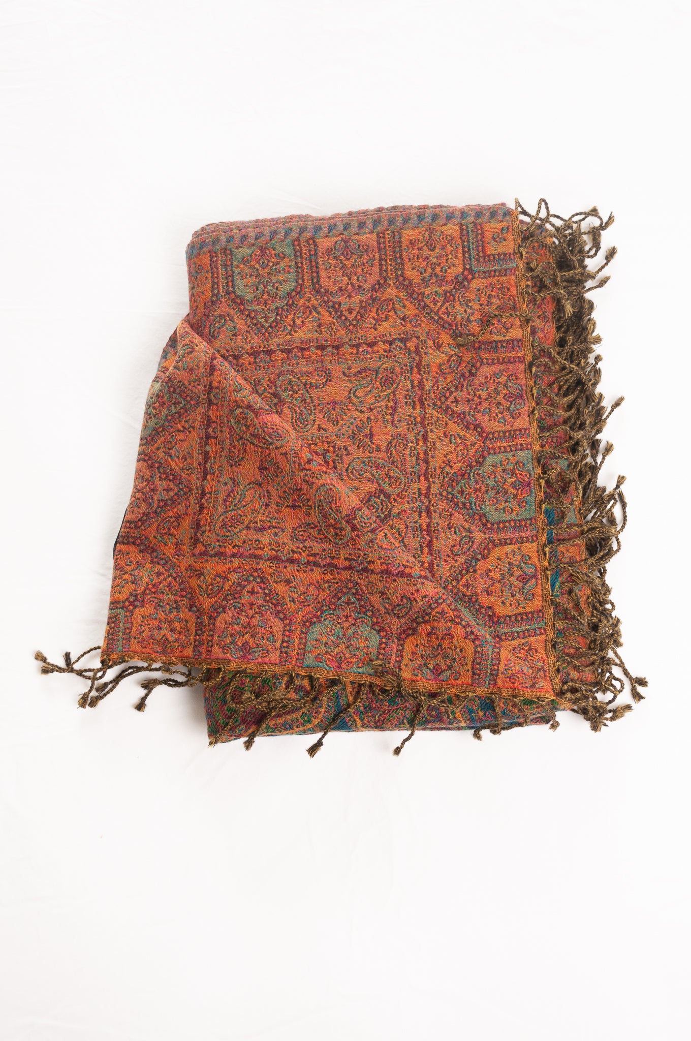 Juniper Hearth jewel tones, ruby sapphire and emerald, pure wool jacquard paisley tasseled throw.