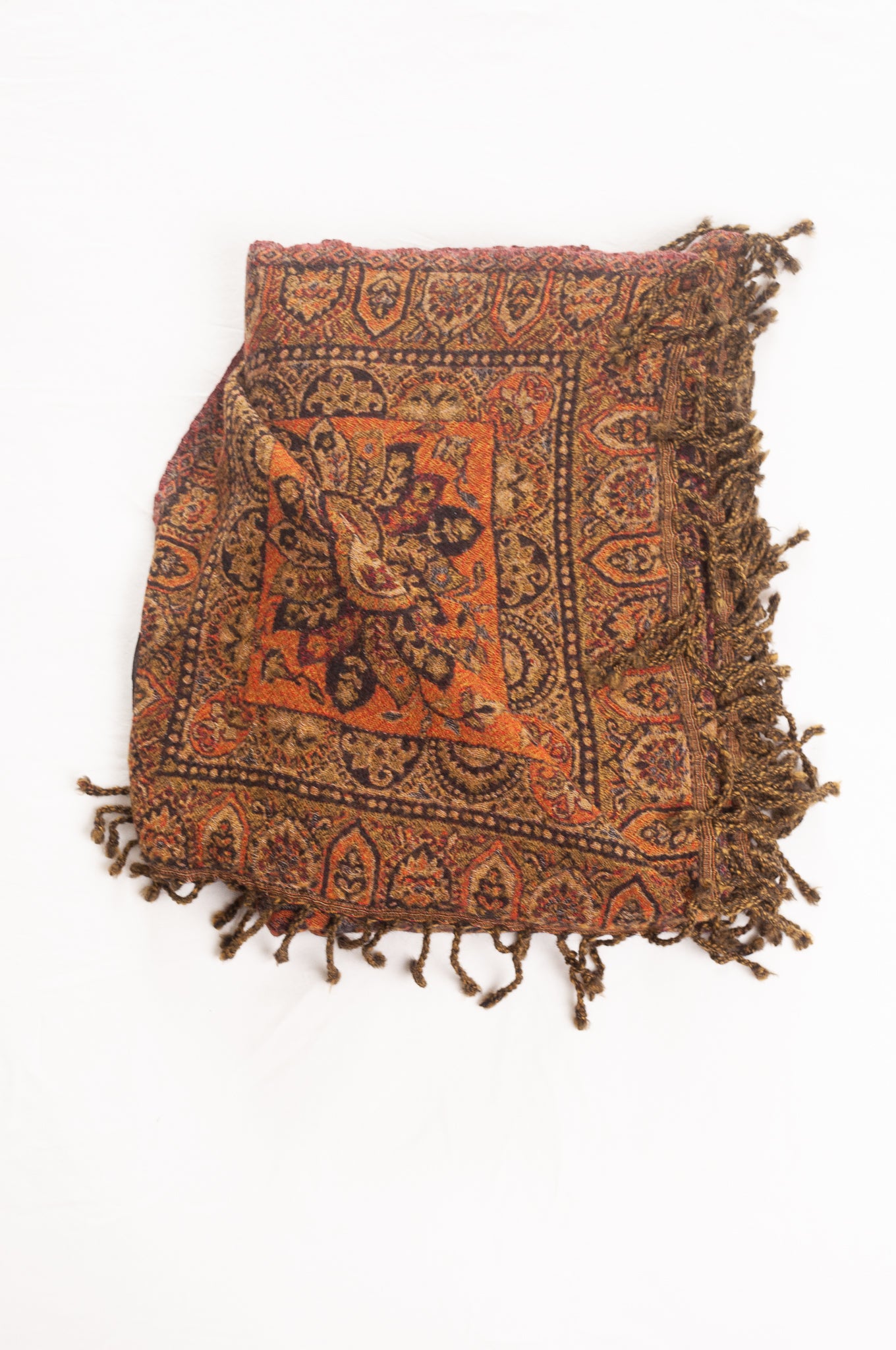 Juniper Hearth olive and burgundy pure wool jacquard paisley tasseled throw.