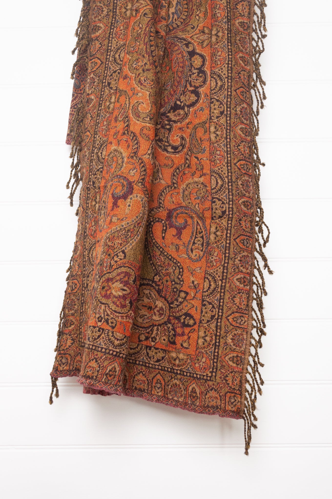 Juniper Hearth olive and burgundy pure wool jacquard paisley tasseled throw.