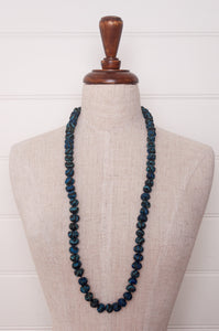 Neeru Kumar handmade fabric beads from silk shibori remnants in sapphire blue and green.