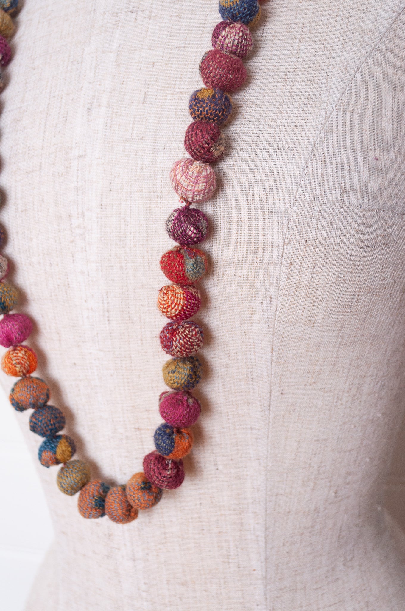 Neeru Kumar fabric beads, handcrafted from handwoven wool remnants.