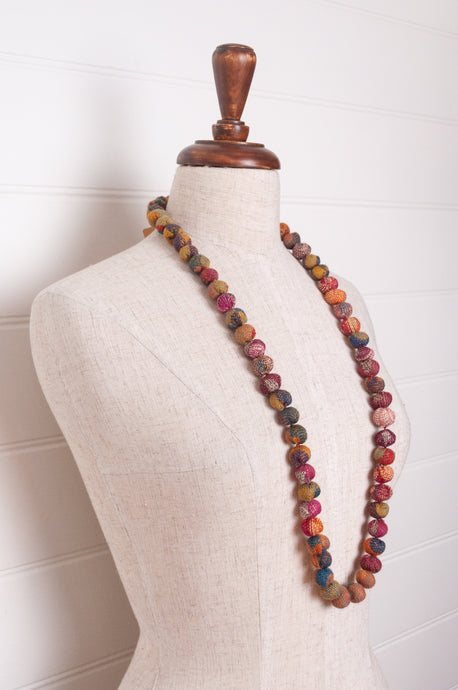 Neeru Kumar fabric beads, handcrafted from handwoven wool remnants.