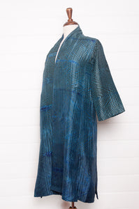 Stunning sapphire and emerald silk shibori coat from Neeru Kumar.