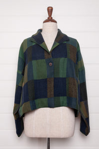 Neeru Kumar handwoven wool blanket check cropped loose fit jacket in indigo navy and emerald green.